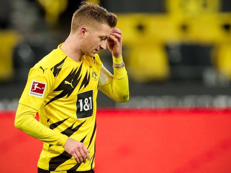 Dortmund captain Marco Reus looking dejected after missing a penalty that would have beaten Mainz.