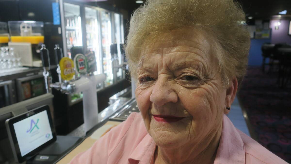 June Beresford today in the bar of the Services Club where she served for thirty years - and (above right) as she then was. See more pictures on pages 5 and 8.