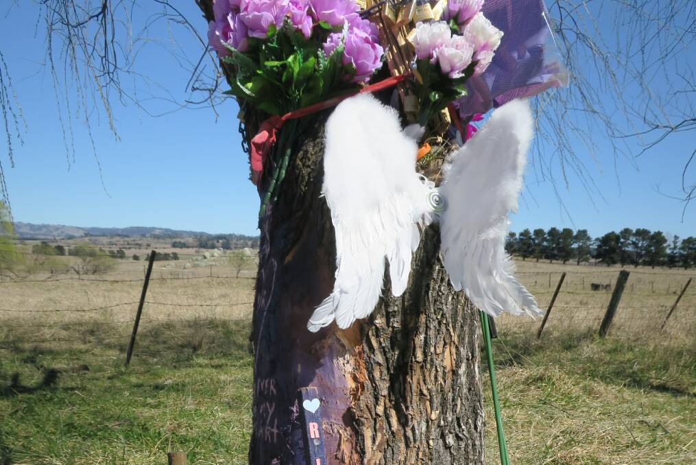  The roadside memorial for Tamika Atkins who died from her injuries. 