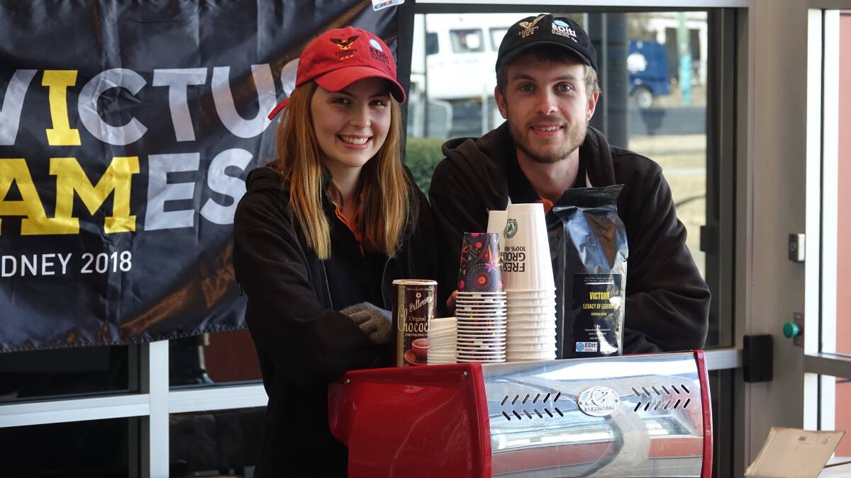 Brad (right) and Brodie and their coffee cart.