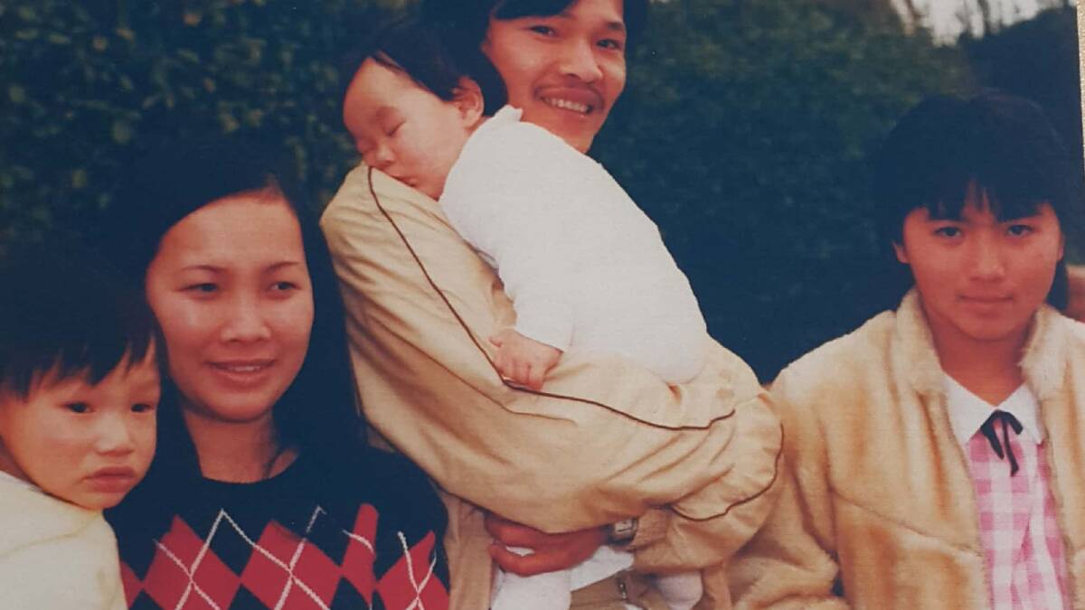 Le Thach on the right with her family.
