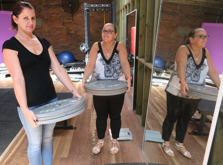 Round of applause: Michelle Pedley and Mel Jones both lost more than 15 kilograms in 10 weeks – the same amount as these weights.