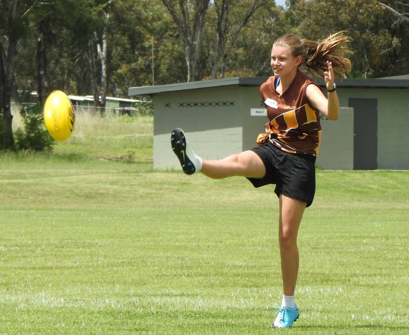 She came up from Victoria with her parents and they yearned for football. Now they're promoting their passion in Glen Innes.