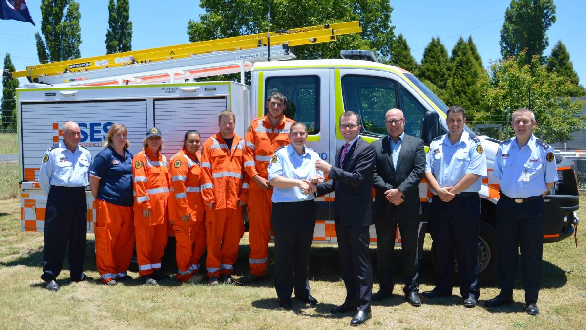 Northern Tablelands MP, Adam Marshall, presents Glen Innes SES Controller, Sarah White, with the keys to the Unit’s light storm response vehicle.