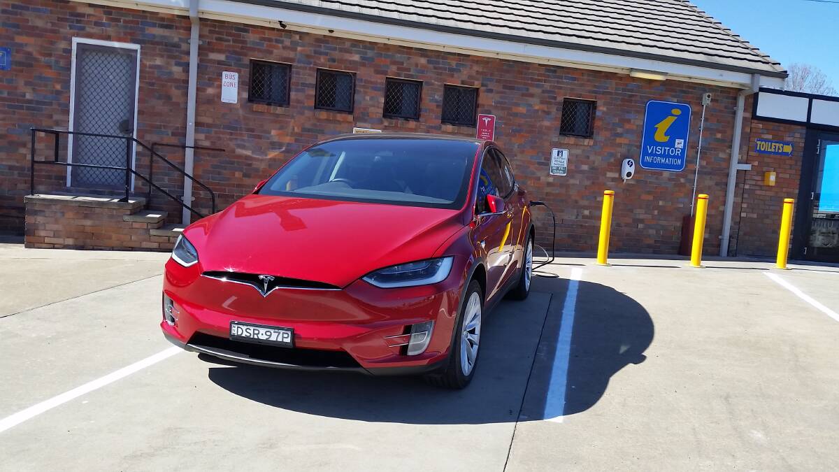 The Tesla at the Glen Innes charging point. There are two chargers - one for Teslas only and the other for all makes.