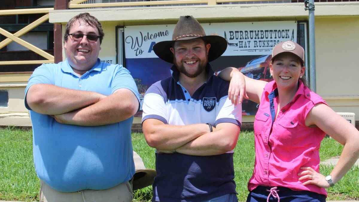 Armidale Show Society president Kelso Looker with society committee members Adam and Jess Tadman.