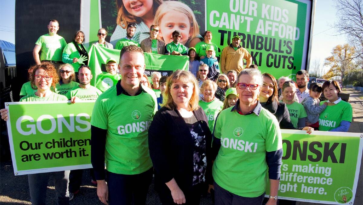GIVE A GONSKI: Mercurius Goldstein,Correna Haythorpe and Susan Armstead with demonstrators outside the Glen Innes High School. PHOTO: Tony Grant