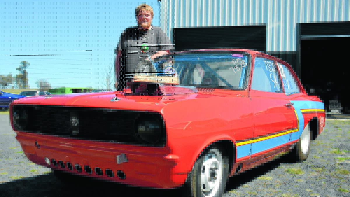 o Heritage: Blake March stands proudly beside his beloved nostalgia car gifted to him by his parents. The specially designed winner’s trophy he picked up recently includes a gear shift lever and other items relevant to his sport. “Something a little bit different and more in keeping with what he does,” said his father Andrew.