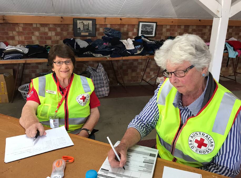 Red Cross volunteers in Glen Innes at the evacuation centre after the Wytaliba fire.